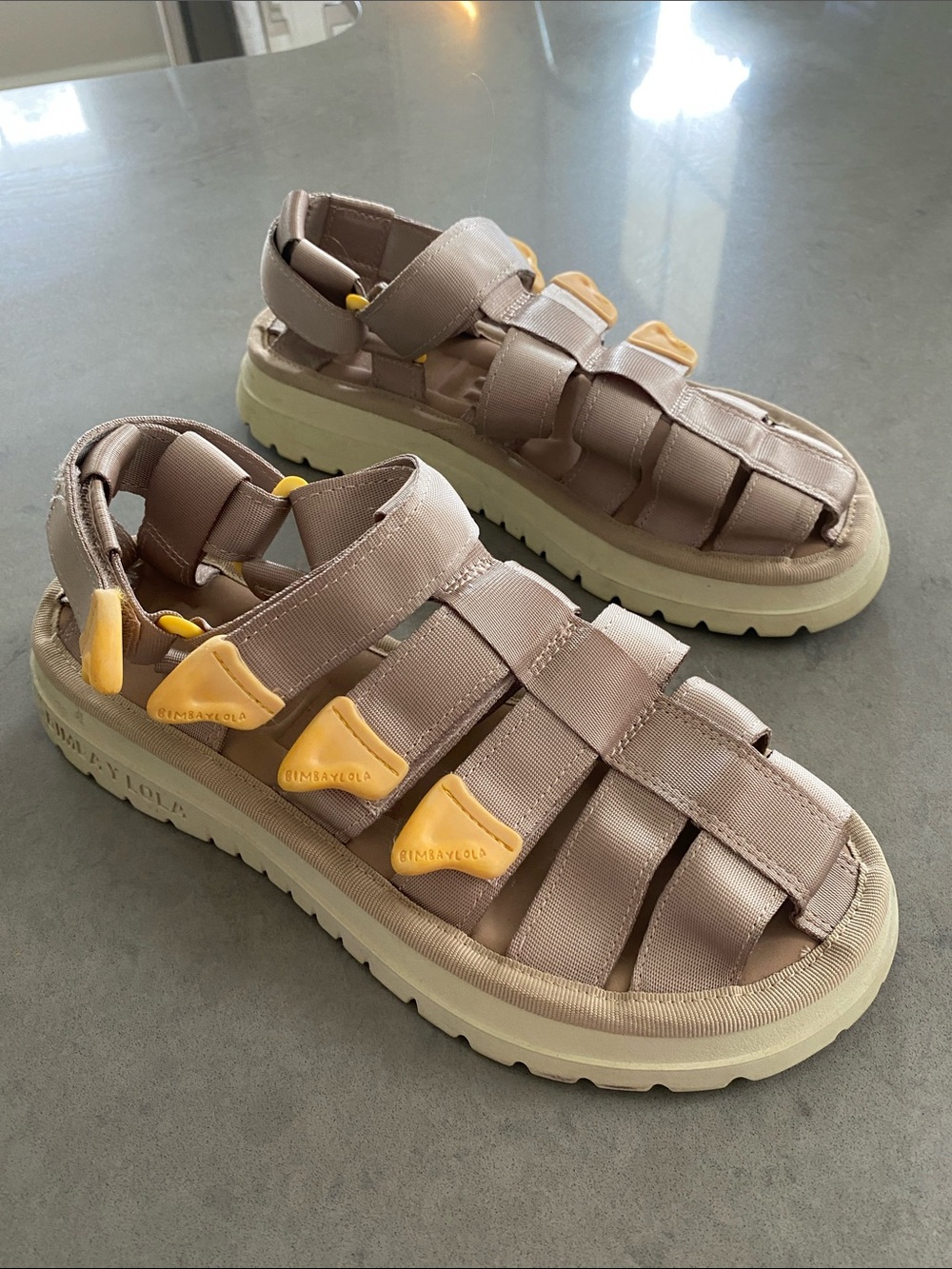 Bimba y Lola fisherman platform velcro sandals in beige with yellow logo accents